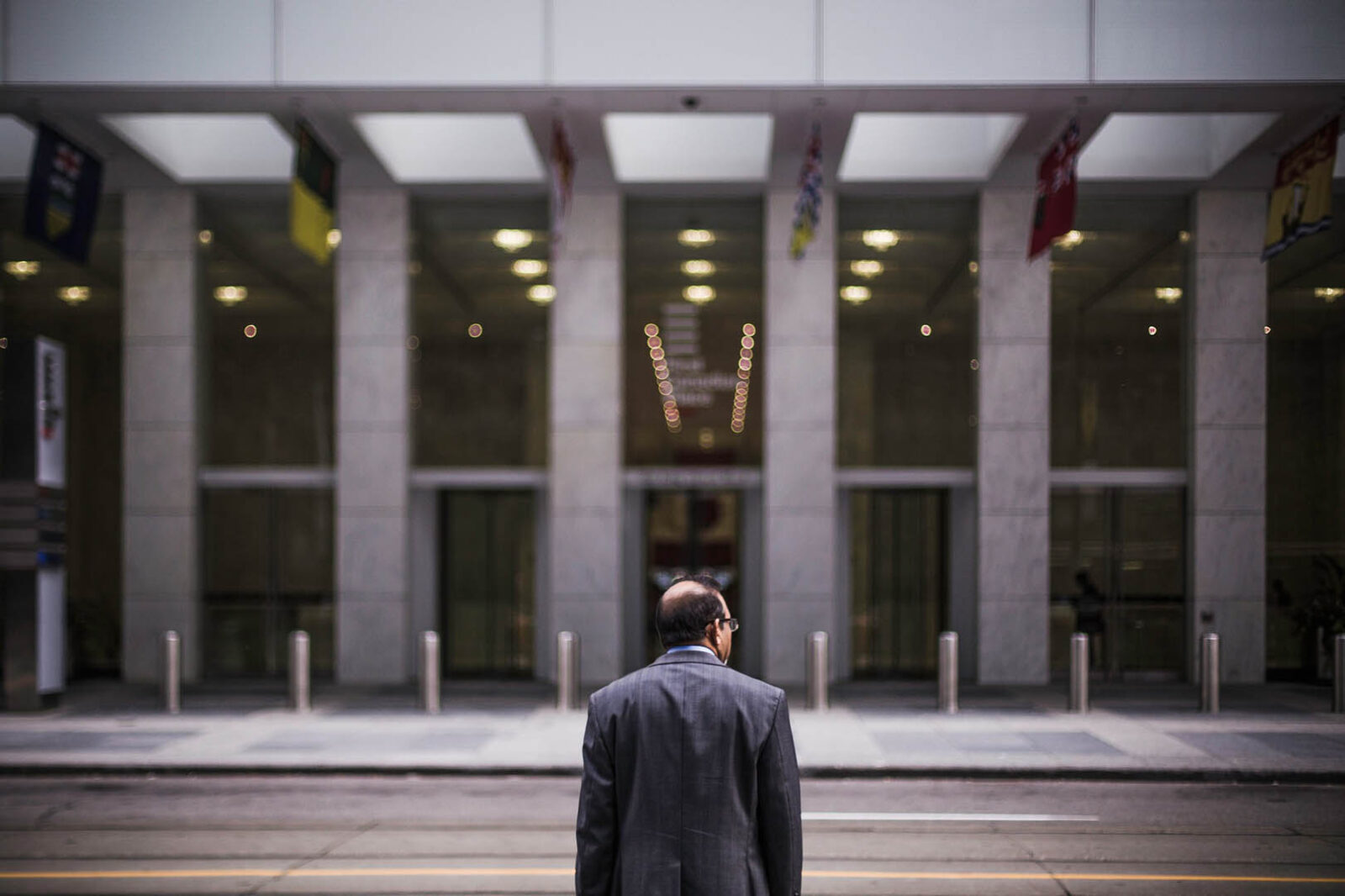 Office worker in front of building